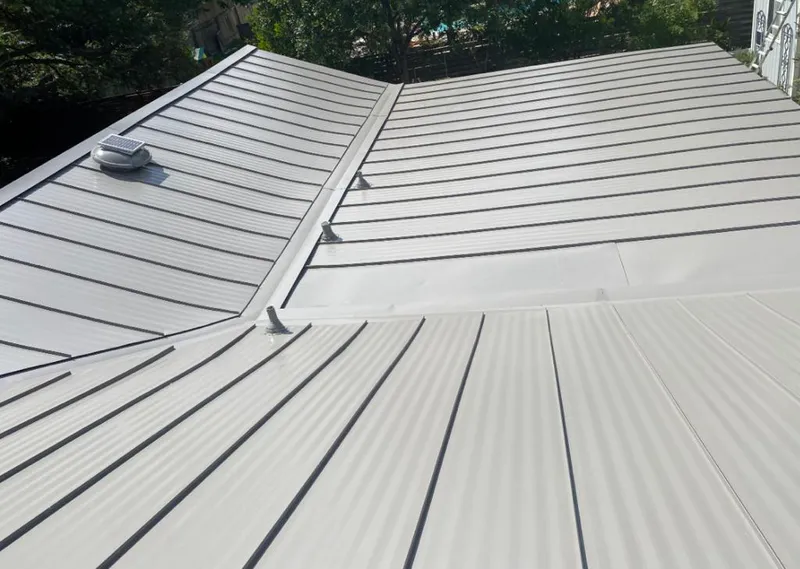 Solar attic fan installed on a metal roof for Roof Ventilation in Twin Falls