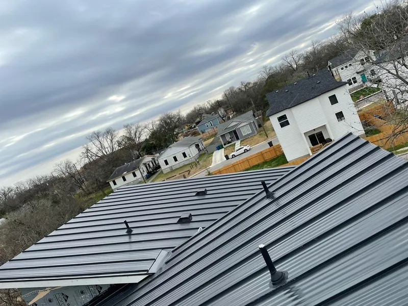 Standing seam metal roof panels with vents for Skylight Repair in Twin Falls